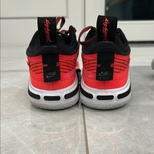 Nike Red and Black Athletic Shoes with Chunky Sole and Cushioned Midsole